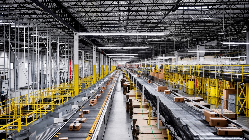 Automated distribution center with conveyor belts and fulfillment operations